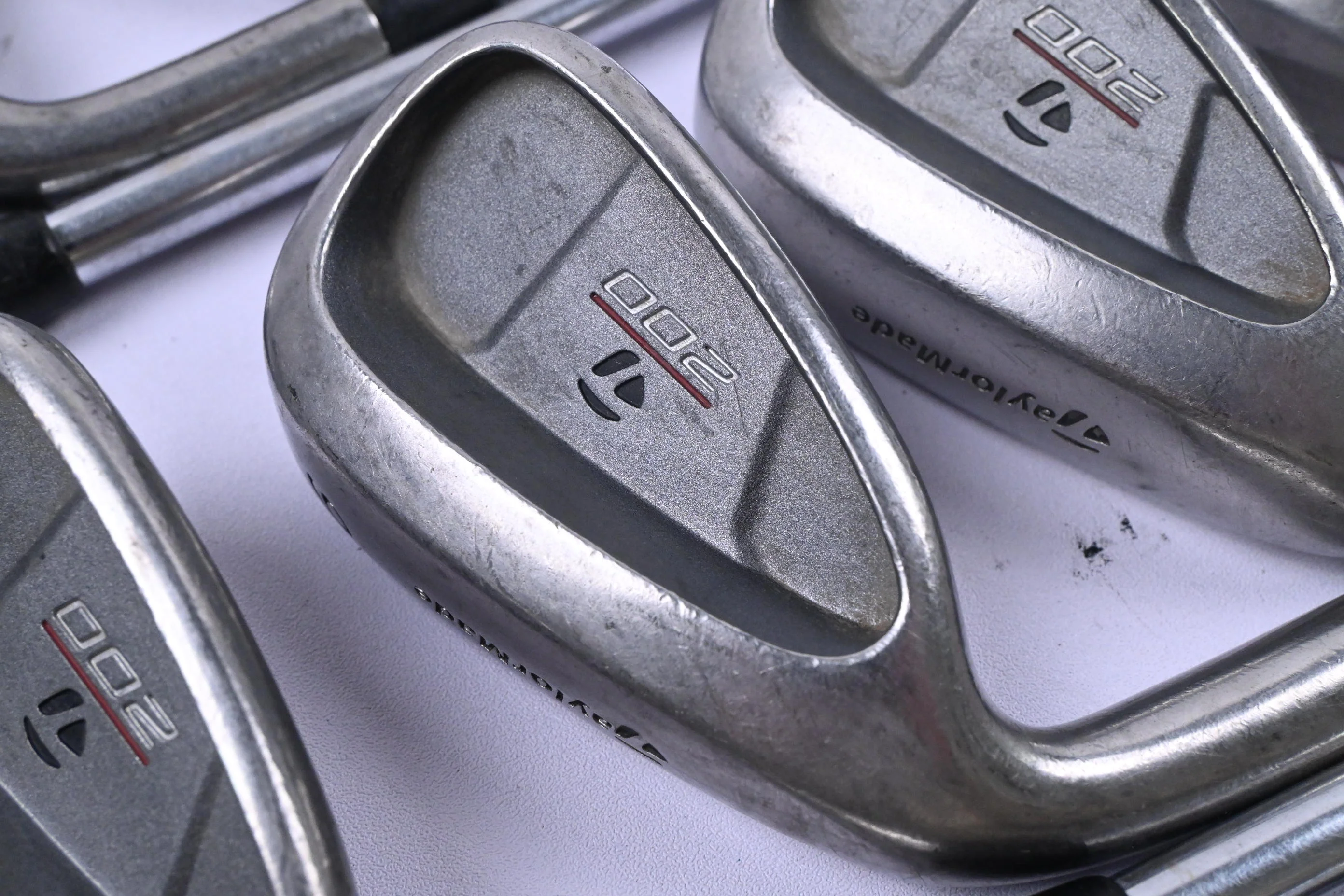 Left Hand Taylormade 200 Steel Irons / 3-PW+SW / Regular Flex Steel Shafts