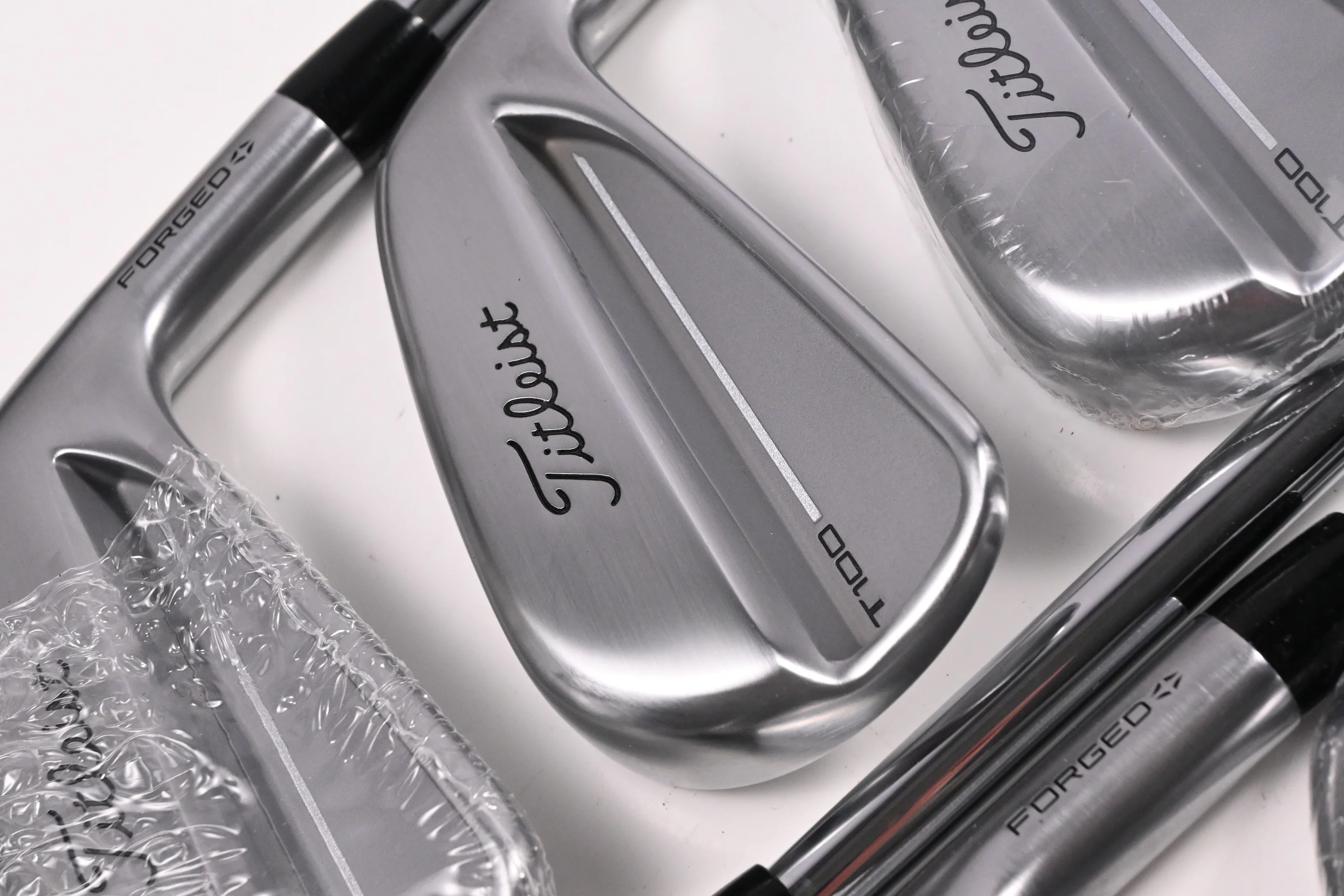 Titleist T100 2025 Irons / 4-PW / Stiff Flex True Temper AMT White Shafts